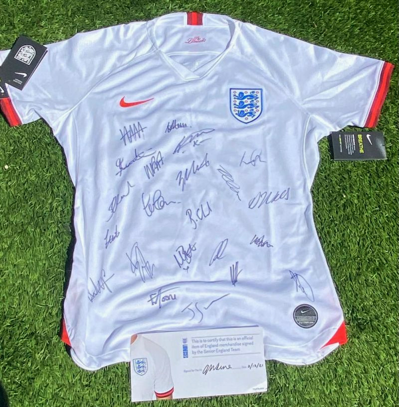 Football shirt with signatures