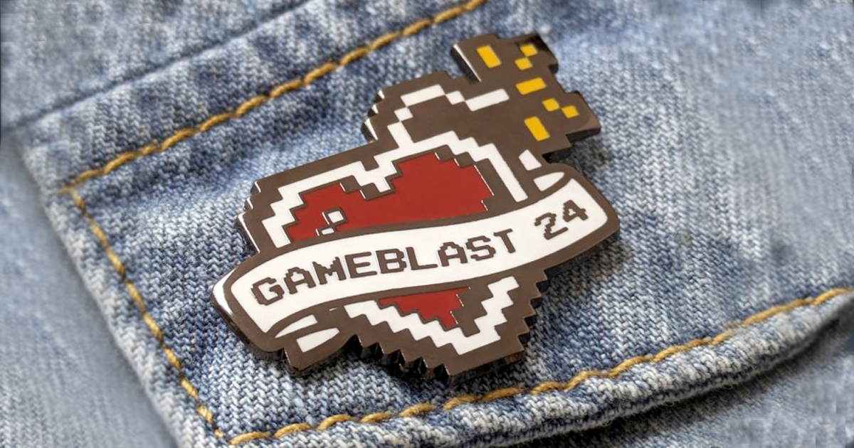 Heart-shaped pin badge on denim label